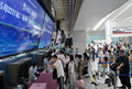福州長楽国際空港で搭乗手続きをする乗客（2023年5月22日撮影）。(c)Xinhua News