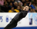 フィギュアスケート全米選手権（2013 Prudential U.S. Figure Skating Championships）は25日、米ネブラスカ（Nebraska）州オマハ（Omaha）にあるセンチュリーリンク・センター（CenturyLink Center）で行われ、男子シングル・ショートプログラム（SP）では、前回王者のジェレミー・アボット（Jeremy Abbott）が84.10点で首位に立った。

演技に臨むジェレミー・アボット（2013年1月25日撮影）。(c)AFP/Getty Images/Jonathan Daniel