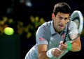 ドバイ・テニス選手権（Dubai Duty Free Tennis Championships 2014）、男子シングルス準決勝。リターンを打つノバク・ジョコビッチ（Novak Djokovic、2014年2月28日撮影）。(c)AFP/MARWAN NAAMANI