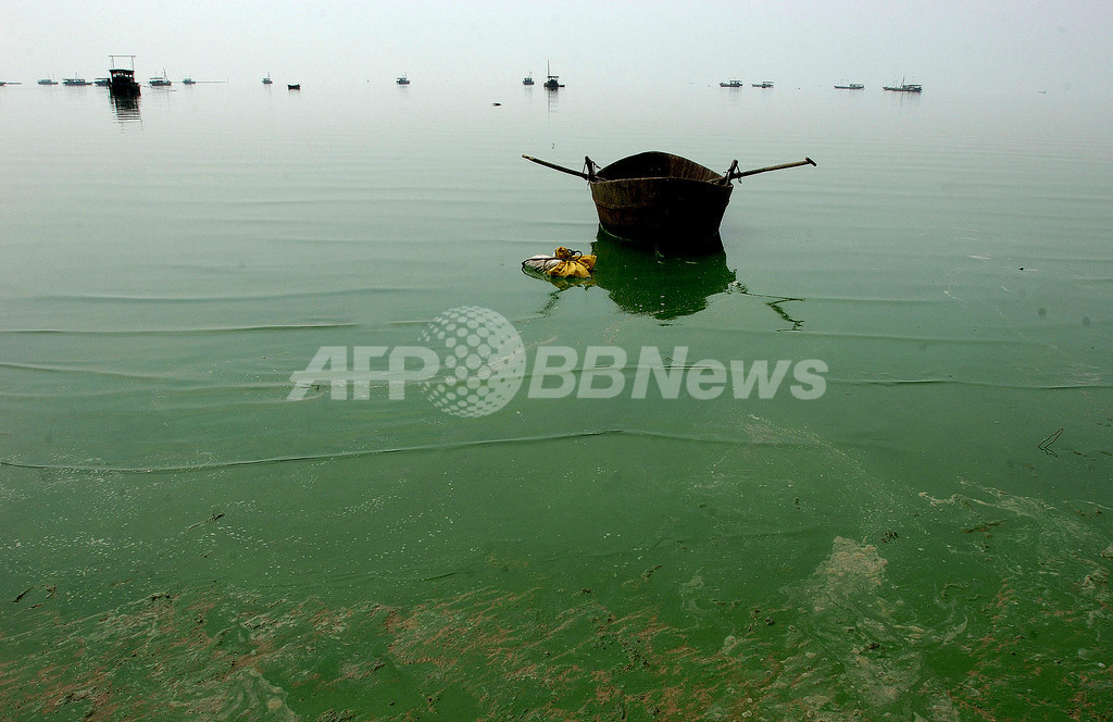 中国で川の水に触れた60人以上が病院へ 中国で川の水に触れた60人以上が病院へ