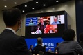 中国・北京で開かれた米中関係に関する討論会の様子（2021年2月22日撮影）。(c)GREG BAKER / AFP