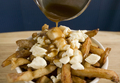 カナダ東部ケベック（Quebec）州の伝統料理「プーティン（Poutine%）」（2007年11月20日撮影）。(c)AFP/David BOILY