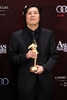 香港（Hong Kong）で開かれた第5回アジア・フィルム・アワード（Asian Film Awards）の授賞式で、監督賞を受賞した韓国のイ・チャンドン（Lee Chang-Dong）監督（2011年3月21日撮影）。(c)AFP/ED JONES