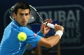 テニス、ドバイ・テニス選手権、男子シングルス2回戦。リターンを狙うノバク・ジョコビッチ（2015年2月25日撮影）。(c)AFP/MARWAN NAAMANI