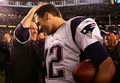 写真は、試合後にビル・ベリチック（%%Bill Belichick%%、左）ヘッドコーチと喜び合うペイトリオッツのQBトム・ブレイディ（%%Tom Brady%%、右）。(c)AFP/Getty Images Harry How