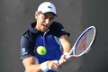 全豪オープンテニス、男子シングルス1回戦。リターンを打つエリオット・ベンシェトリ（2020年1月21日撮影）。(c)Greg Wood / AFP