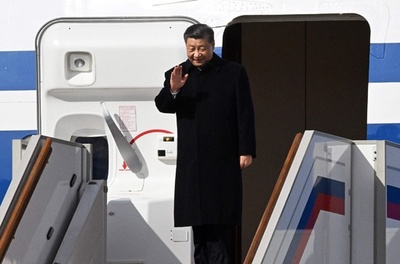 習氏、ロシア到着 プーチン氏と会談へ
