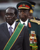 ジンバブエの首都ハラレ（Harare）で、大統領就任式に臨むロバート・ムガベ（Robert Mugabe）大統領（2008年6月29日撮影）。(c)AFP/Alexander Joe