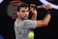全豪オープンテニス、男子シングルス3回戦。リターンを狙うグリゴール・ディミトロフ（2017年1月22日撮影）。(c)AFP/SAEED KHAN