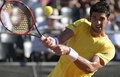 男子テニス、国別対抗戦デビスカップワールドグループ1回戦、アルゼンチン対ブラジル。リターンを打つブラジルのトーマス・ベルッチ（2015年3月6日撮影）。(c)AFP/JUAN MABROMATA