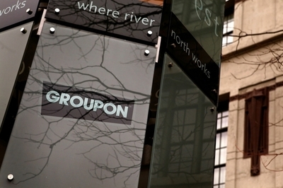 グルーポンが中国進出、米共同購入サイト