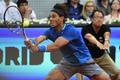 テニス、マドリード・オープン（Mutua Madrid Open 2014）男子シングルス決勝。リターンを打つラファエル・ナダル（Rafael Nadal、2014年5月11日撮影）。(c)AFP/PIERRE-PHILIPPE MARCOU