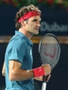 ドバイ・テニス選手権（Dubai Duty Free Tennis Championships 2014）、男子シングルス準決勝。ポイントを奪い喜ぶロジャー・フェデラー（Roger Federer、2014年2月28日撮影）。(c)AFP/MARWAN NAAMANI