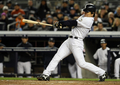 09MLBワールドシリーズ（7回戦制）、ニューヨーク・ヤンキース（%%New York Yankees%%）対フィラデルフィア・フィリーズ（%%Philadelphia Phillies%%）第6戦。試合はヤンキースが7-3で勝利し、9年ぶり27度目のワールドシリーズ制覇を果たした。写真は3回に2点適時打を放つヤンキースの松井秀喜（%%Hideki Matsui%%）。（2009年11月4日撮影）(c)AFP/Getty Images/Nick Laham