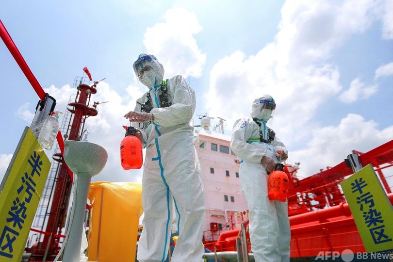 中国、新規感染者71人 出国制限を強化