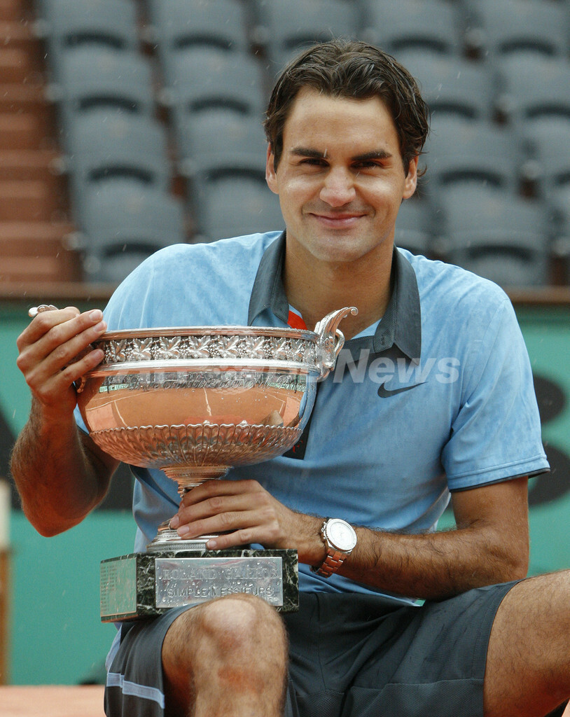フェデラーが全仏オープン初優勝 、生涯グランドスラム達成 写真