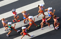 第13回世界陸上大邱大会（13th IAAF World Championships in Athletics Daegu）は31日、5日目の競技が行われ、女子20キロメートル競歩決勝でロシアのオリガ・カニスキナ（Olga Kaniskina）が1時間29分42秒で優勝し、大会3連覇を果たした。

レースに臨む選手（2011年8月31日撮影）。(c)AFP/MARK RALSTON