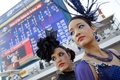 南アフリカ・ダーバンで開催された、アフリカ大陸最大の競馬レースである「ダーバンジュライ」の様子（2015年7月4日撮影）。(c)AFP/RAJESH JANTILAL