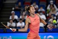 女子テニス、武漢オープン、シングルス準々決勝。リターンを狙う鄭欽文（2024年10月11日撮影）。(c)WANG Zhao / AFP