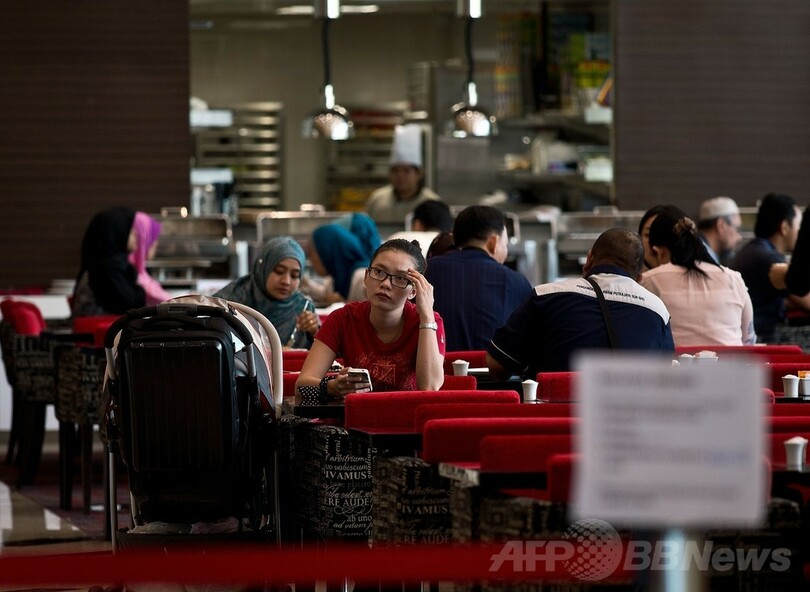 不明機捜索で深まる「混乱」、マレーシアに非難集中