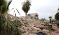 シリア北部アレッポ（Aleppo）で、政府軍の拠点として利用され、反体制派によって爆破されたホテル（2014年5月8日撮影）。(c)AFP