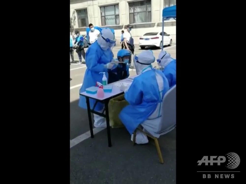 動画：中国吉林市、出前配達員２千人以上に無料で核酸検査 - AFPBB News
