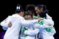第52回世界体操競技選手権、女子団体決勝。優勝を喜ぶ米国の選手（2023年10月4日撮影）。(c)KENZO TRIBOUILLARD / AFP