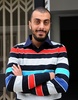チュニジアの首都チュニス（Tunis）にある自身の事務所前で撮影されたソフィアン・チョウラビ（Sofiene Chourabi）氏（2012年10月30日撮影）。(c)AFP/FETHI BELAID