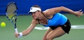女子テニス、BMWマレーシア・オープン、シングルス準決勝。リターンを狙うアレクサンドラ・ダルゲルー（2015年3月7日撮影）。(c)AFP/UTUSAN MELAYU (M) BERHAD