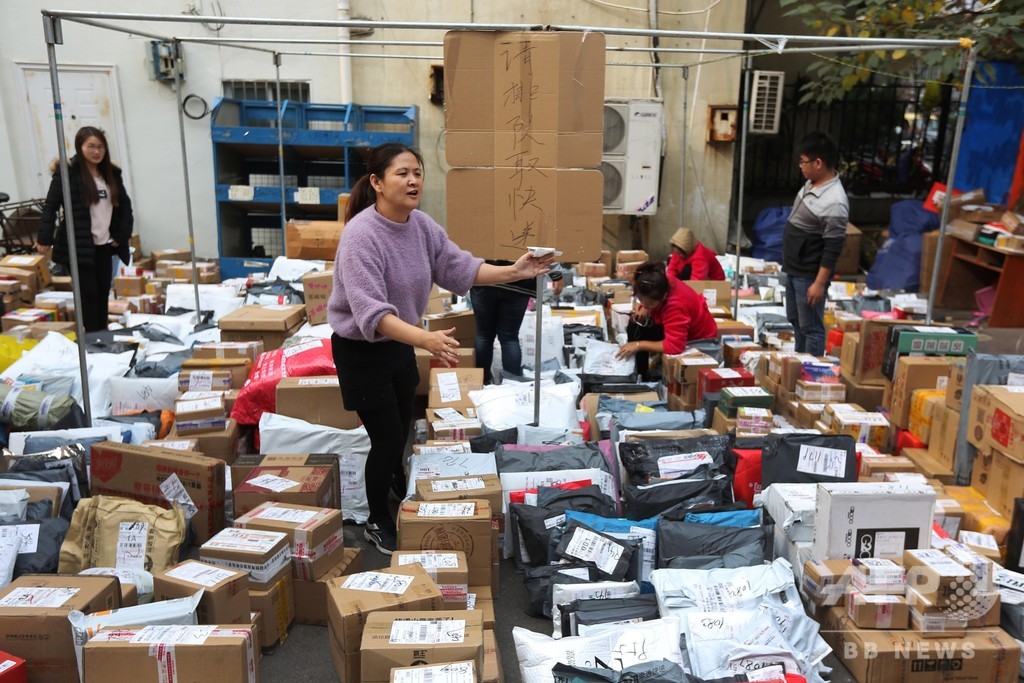中国「独身の日」期間中の郵便物処理量、最高1日4億件 中国「独身の日」期間中の郵便物処理量、最高1日4億件