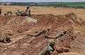 イスラエル南部スデロット近郊で、身を隠すイスラエル兵（2021年5月13日撮影）。(c)Menahem KAHANA / AFP