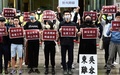 香港で、中国の「香港国家安全法」に抗議する香港と台湾の学生ら（2020年5月28日撮影）。(c)Sam Yeh / AFP