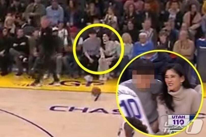 NBAの試合を観戦するイ・ブジン氏と息子＝オンラインコミュニティ(c)news1