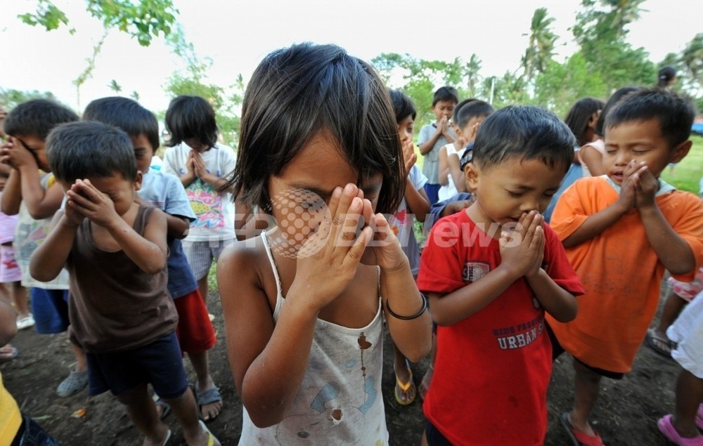 最も信心深い国はフィリピン 無神論広がる東欧 写真1枚 国際ニュース Afpbb News