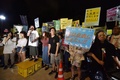 都内の国会議事堂付近で、「共謀罪」の趣旨を含む改正組織犯罪処罰法に反対する人々（2017年6月14日撮影）。(c)AFP/Kazuhiro NOGI