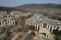 中国・瀋陽郊外で建設途中のまま放置された開発プロジェクト「ステート・ゲスト・マンションズ」（2023年3月31日撮影）。(c)Jade GAO / AFP