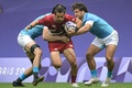 パリ五輪、7人制ラグビー男子11-12位決定戦、日本対ウルグアイ。突破を図る石田大河（中央、2024年7月27日撮影）。(c)CARL DE SOUZA/ AFP