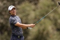 男子ゴルフの今季メジャー第3戦、全米オープン選手権2日目。12番でティーショットを打つ石川遼（2023年6月17日撮影）。(c)Richard Heathcote/Getty Images/AFP
