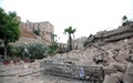 シリア北部アレッポ（Aleppo）で、政府軍の拠点として利用され、反体制派によって爆破されたホテル（2014年5月8日撮影）。(c)AFP