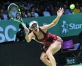女子テニス、WTAツアー選手権（BNP Paribas WTA Championships - Singapore 2014）4日目。リターンを狙うカロリーネ・ボズニアツキ（Caroline Wozniacki、2014年10月23日撮影）。(c)AFP/ROSLAN RAHMAN
