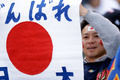 第3回ワールド・ベースボール・クラシック（2013 World Baseball Classic、WBC）は17日、米カリフォルニア（California）州サンフランシスコ（San Francisco）で準決勝が行われ、日本は1-3でプエルトリコに敗れた。

試合開始を待つ日本のファン（2013年3月17日撮影）。(c)AFP/Getty Images/Ezra Shaw