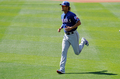 12MLBオープン戦は13日、各地で行われ、テキサス・レンジャーズ（Texas Rangers）のダルビッシュ有（Yu Darvish）は、クリーブランド・インディアンス（Cleveland Indians）戦に先発し、3回を投げて3安打、4四球を与え2失点を喫した。

試合前の練習を行うレンジャーズのダルビッシュ有（2012年3月13日撮影）。(c)AFP/Getty Images/Kevork Djansezian
