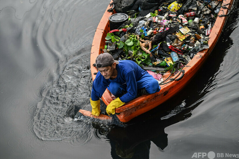 フィリピンの川守る「清掃隊」 プラごみとの終わりなき戦い