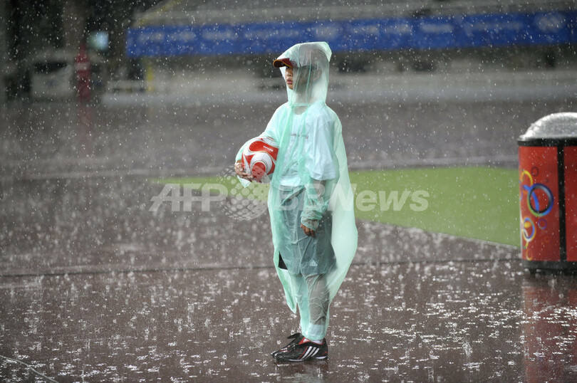 カメラがとらえた北京五輪の表舞台と裏舞台