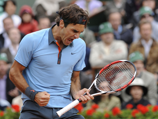 フェデラーが全仏オープン初優勝 、生涯グランドスラム達成 写真