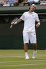 テニス、ウィンブルドン選手権（The Championships Wimbledon 2013）は27日、男子シングルス2回戦が行われ、添田豪（Go Soeda）は0-6、3-6、7-6、3-6で大会第9シードのリシャール・ガスケ（Richard Gasquet、フランス）に敗れた.

落胆した様子を見せる添田豪（2013年6月27日撮影）。(c)AFP/ADRIAN DENNIS