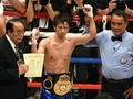 ボクシング、WBA世界ライトフライ級タイトルマッチ12回戦。アルベルト・ロセル（Alberto Rossel）を下し新チャンピオンになった田口良一（Ryoichi Taguchi、2014年12月31日撮影）。(c)AFP/Toru YAMANAKA