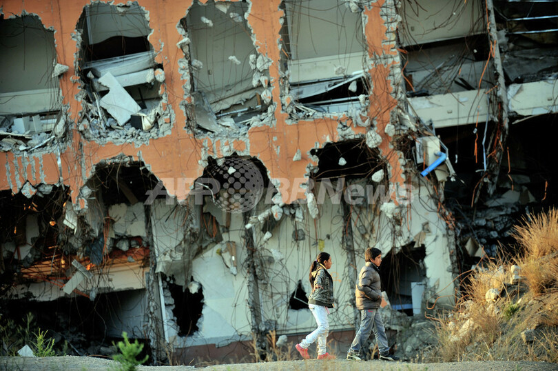 チリ大地震・津波から1年、被災地で追悼式典 進まぬ復興
