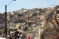 南米チリ中部バルパライソ（Valparaiso）で起きた火災によって全焼した住宅地（2014年4月13日撮影）。(c)AFP/FELIPE GAMBOA