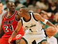 Orlando Magic guard (1) Anfernee Hardaway drives past Miami Heat forward Jamal Mashburn 01 May during the first period of game four of the NBA playoffs at the Arena in Orlando. (c)AFP/TONY RANZE